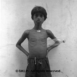 Indian Boy with Bottle