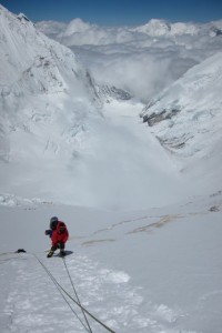 Sherpa on the 'Yellow Band' with the Western Cwm below